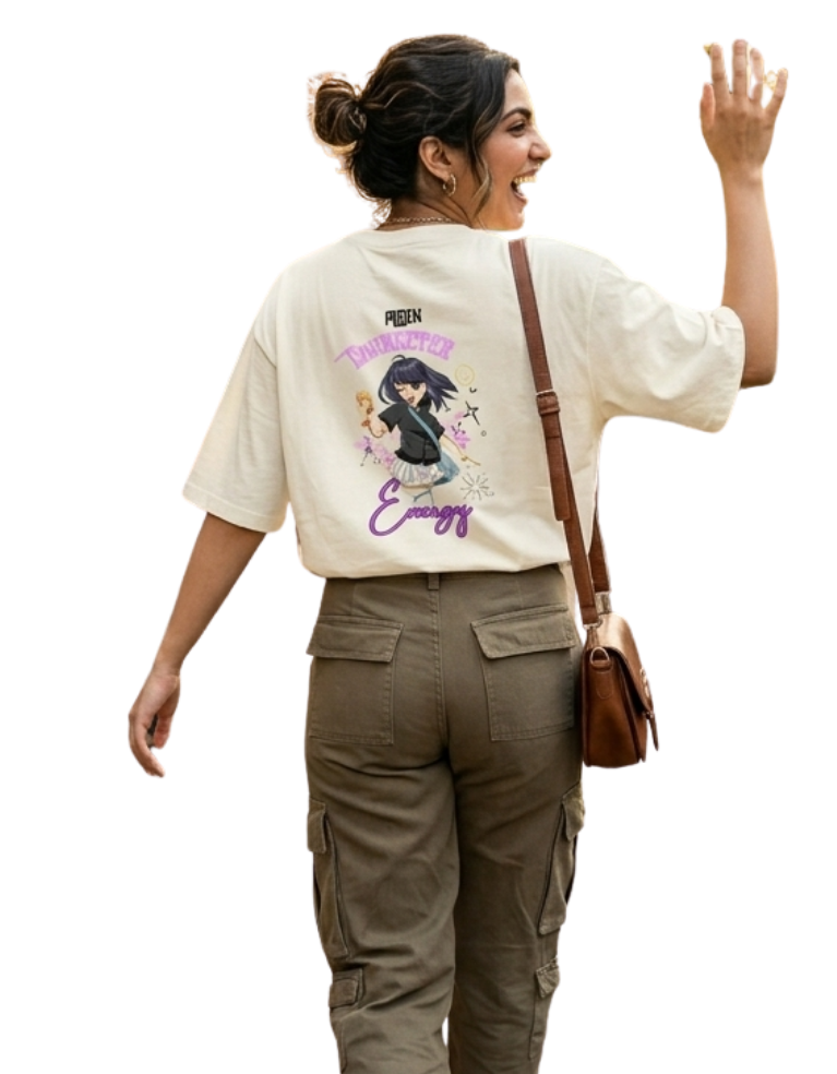 Woman wearing a off-white t-shirt with anime graphic design and cargo pants, walking with a brown bag.