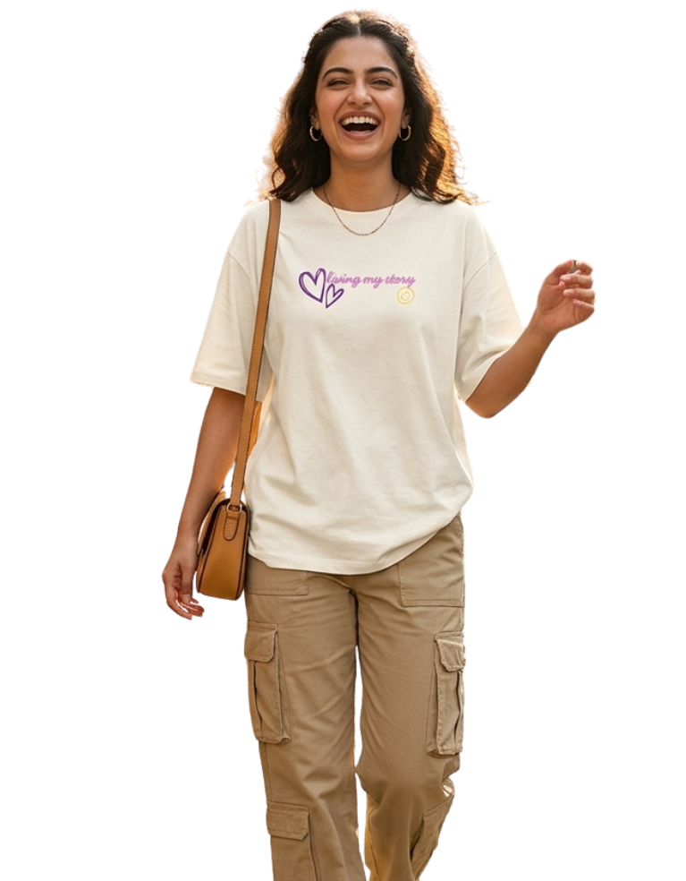 Woman wearing an off-white t-shirt with a logo and beige pants, standing against a white background