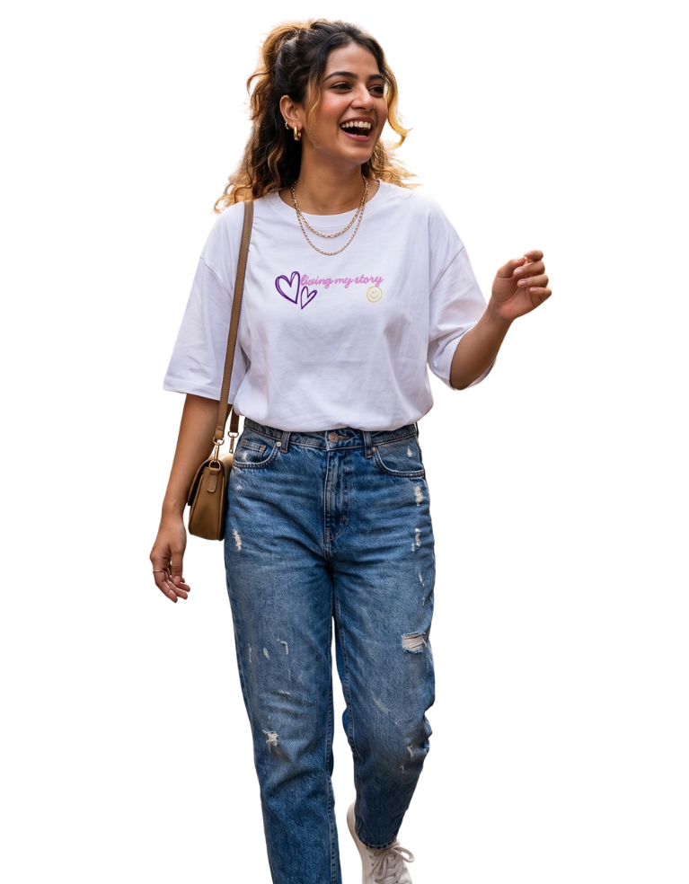 Woman wearing a white t-shirt with text and blue jeans on a white background